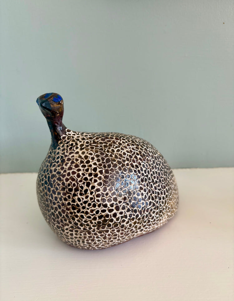Guinea Hen, Three